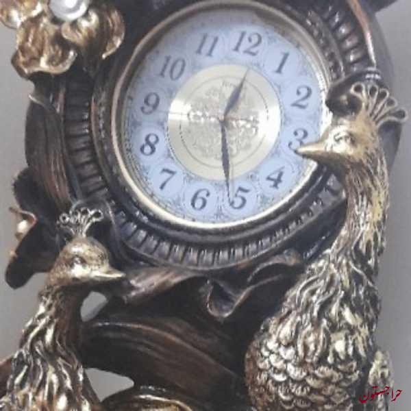 ساعت ایستاده مدل طاووس همراه با ابنما